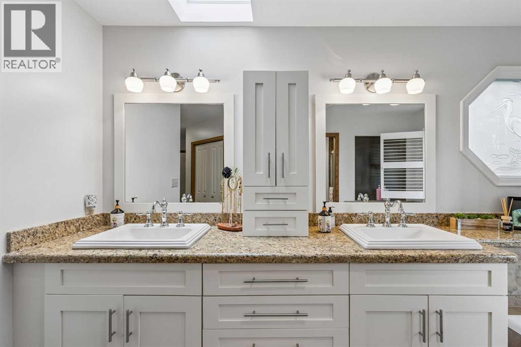 65 Woodpath Terrace Sw, Calgary, Alberta  T2W 5Z5 - Photo 24 - A2320982