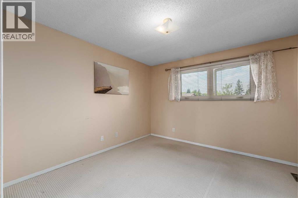 1455 Berkley Drive NW, Calgary, Alberta  T3K 1T6 - Photo 20 - A2318714