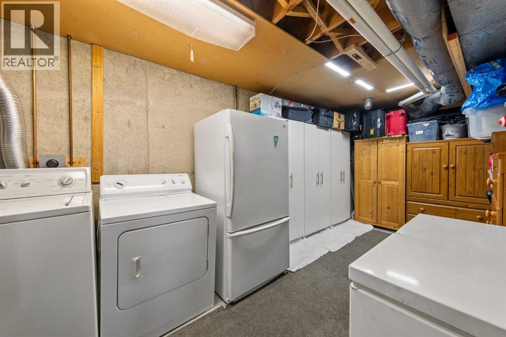 1141 Ninga Road NW, Calgary, Alberta  T2K 2P2 - Photo 28 - A2318600