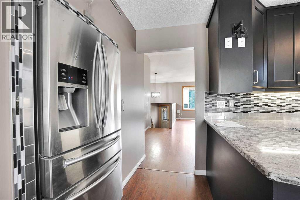 139 Harvest Glen Rise Ne, Calgary, Alberta T3K 4B9 - Photo 23 - A2319674