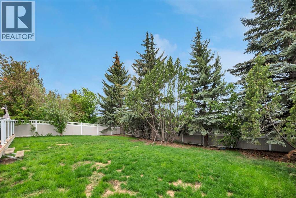 52 Woodpath Terrace SW, Calgary, Alberta  T2W 5Z7 - Photo 7 - A2319891