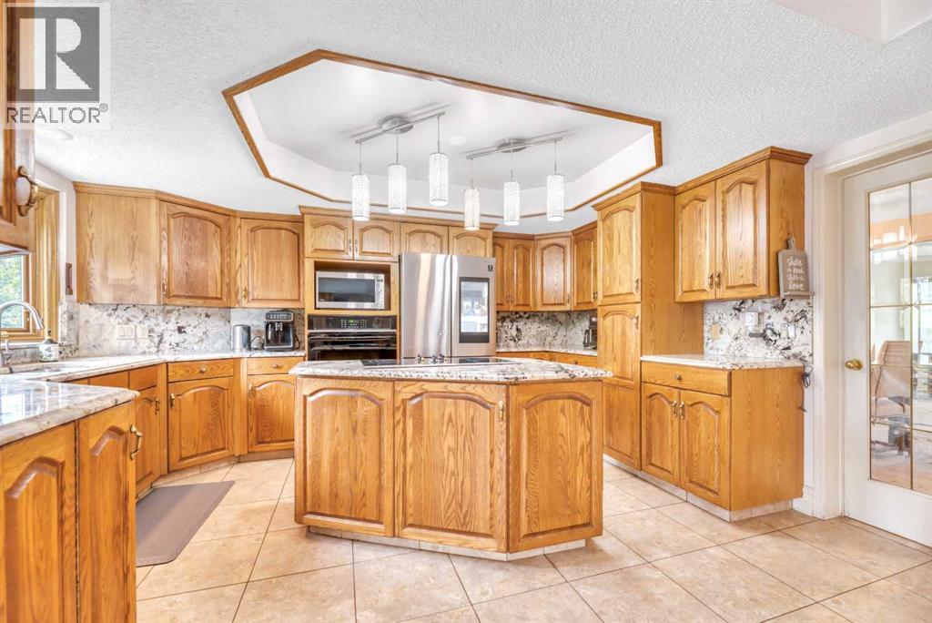 52 Woodpath Terrace SW, Calgary, Alberta  T2W 5Z7 - Photo 25 - A2319891