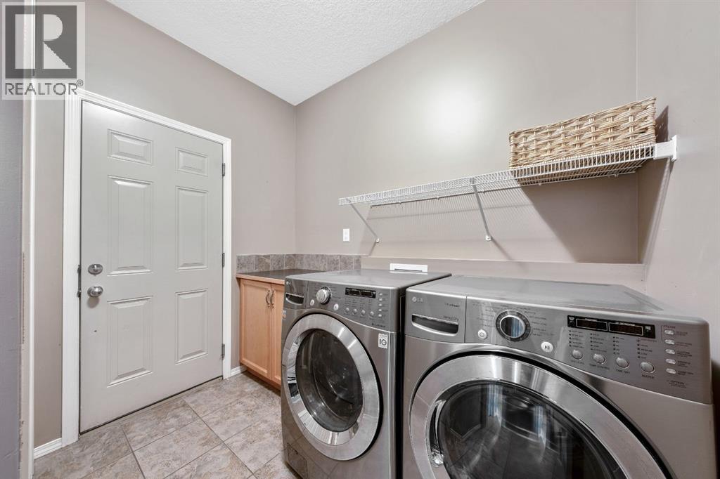106 West Pointe Court, Cochrane, Alberta  T4C 0B9 - Photo 15 - A2317437