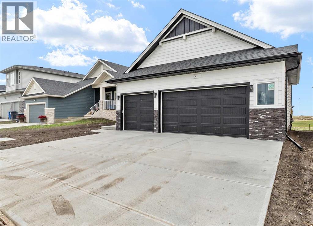 716 Mandalay Avenue, Carstairs, Alberta  T0M 0N0 - Photo 45 - A2318970