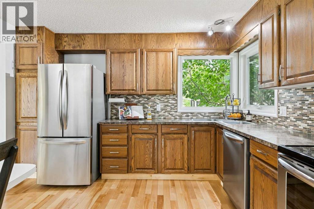 51 Woodbrook Green Sw, Calgary, Alberta  T2W 4P6 - Photo 12 - A2320505