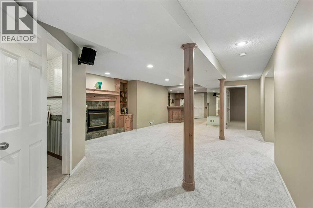 65 Woodpath Terrace SW, Calgary, Alberta  T2W 5Z5 - Photo 30 - A2320982