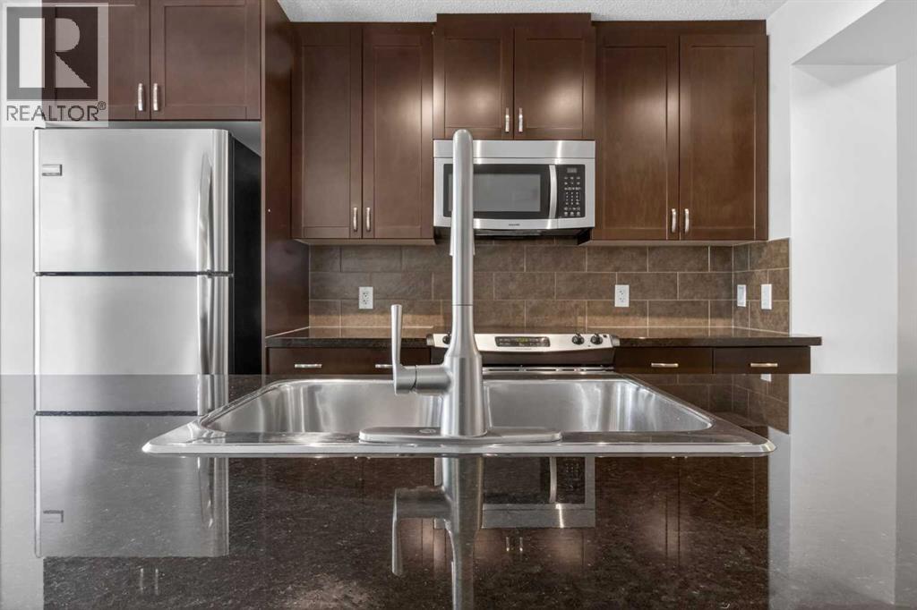 128 Auburn Bay Common Se, Calgary, Alberta T3M 0M5 - Photo 17 - A2316334
