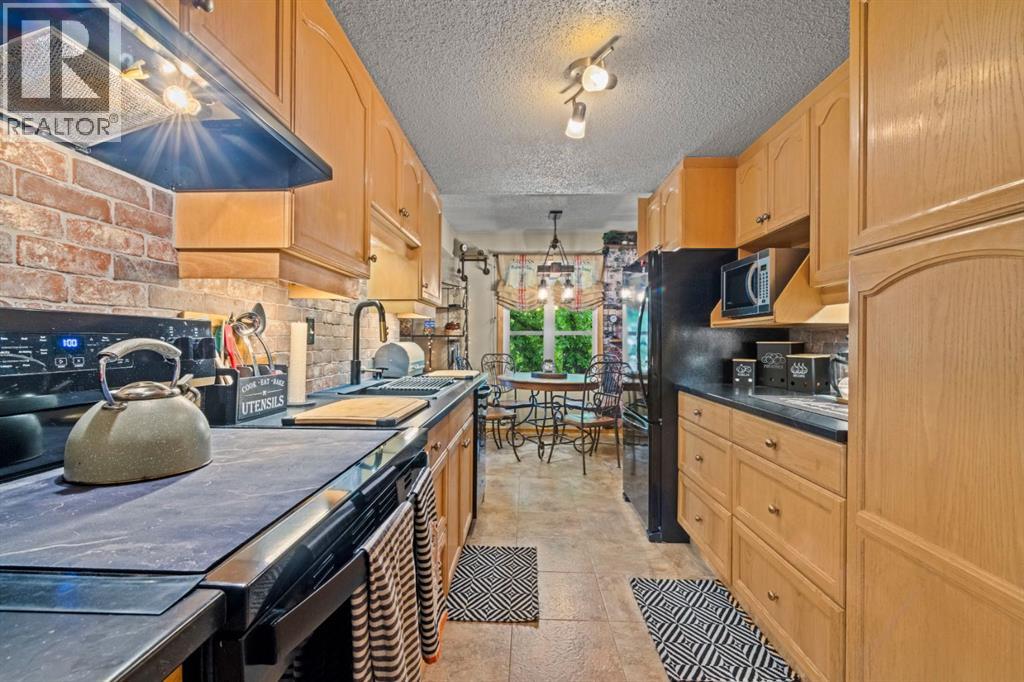 13005 6 Street Sw, Calgary, Alberta  T2W 4J8 - Photo 13 - A2320000