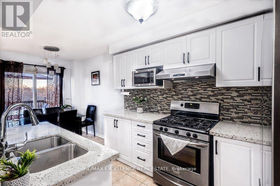 99 Rockgarden Trail, Brampton, Ontario  L6R 3N1 - Photo 6 - W13439072