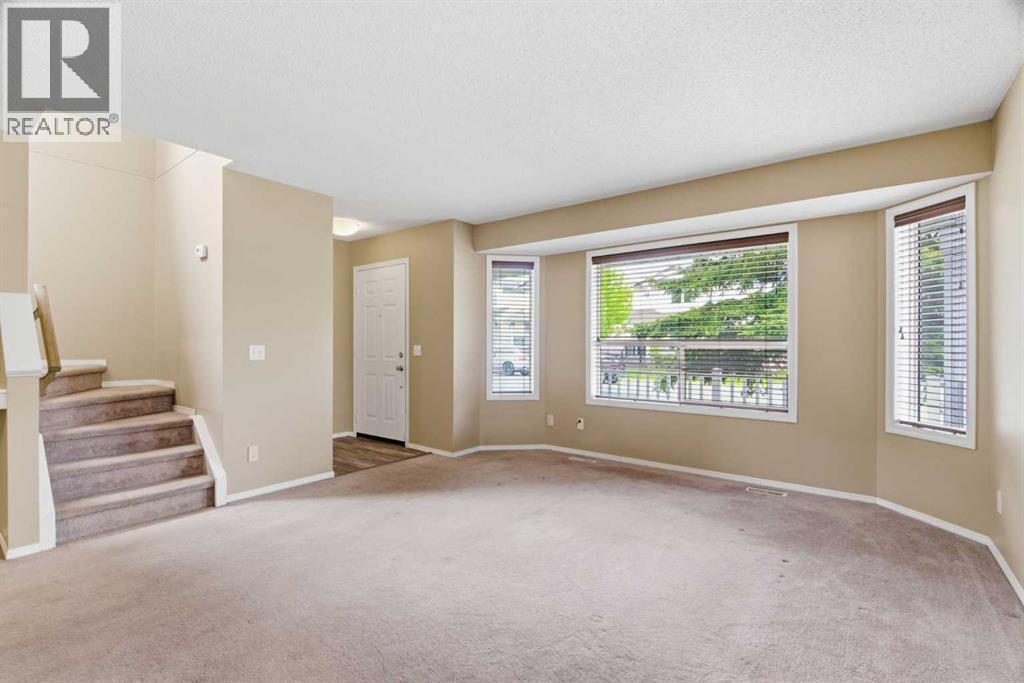 109 Arbour Wood Mews Nw, Calgary, Alberta  T3G 4B5 - Photo 3 - A2317787
