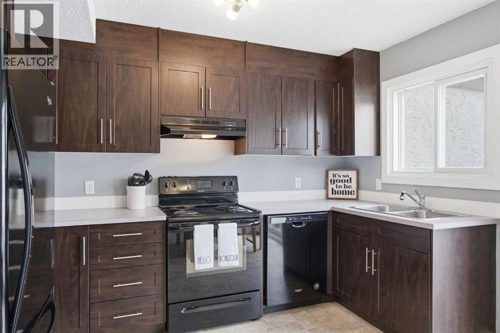 237 Deerpoint Lane Se, Calgary, Alberta  T2J 6M6 - Photo 4 - A2320995