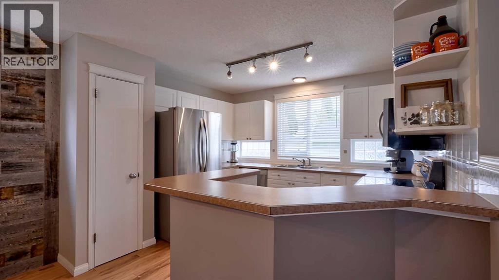 20 Tuscany Valley Park NW, Calgary, Alberta  T3L 2B6 - Photo 12 - A2315770