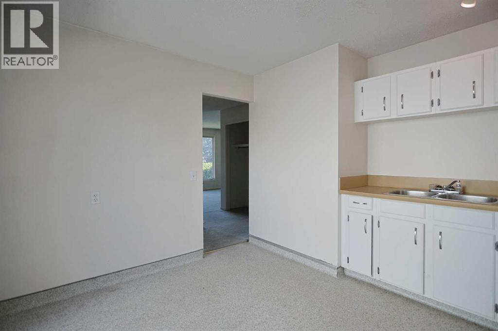 5417 Dalrymple Crescent Nw, Calgary, Alberta  T3A 1R2 - Photo 9 - A2318136