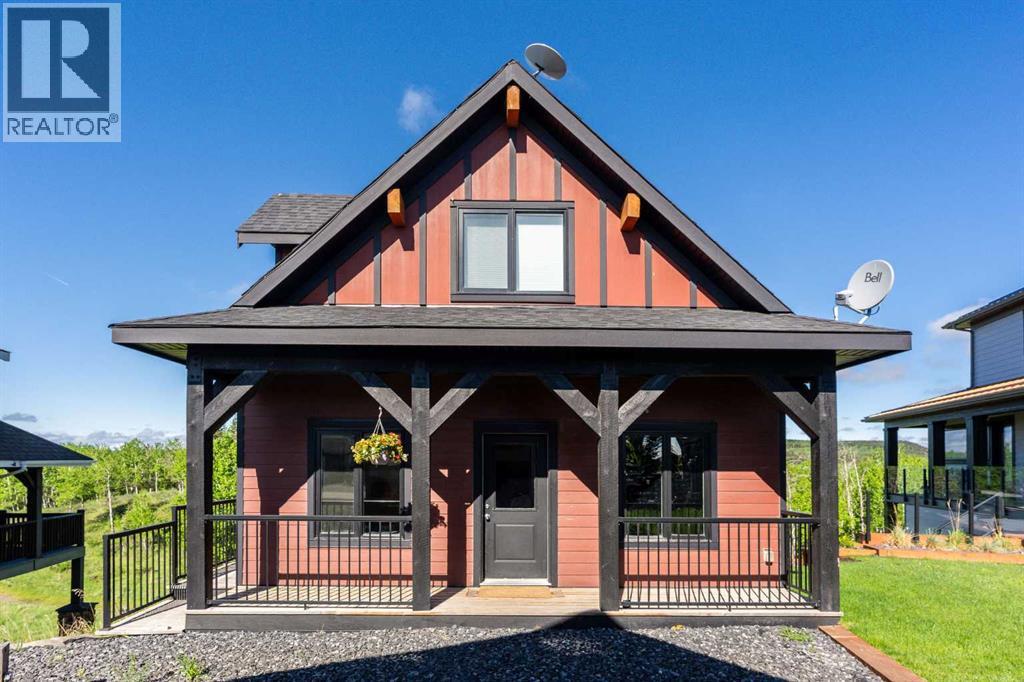 247 Cottageclub Crescent, Rural Rocky View County, Alberta  T4C 1B1 - Photo 5 - A2315059