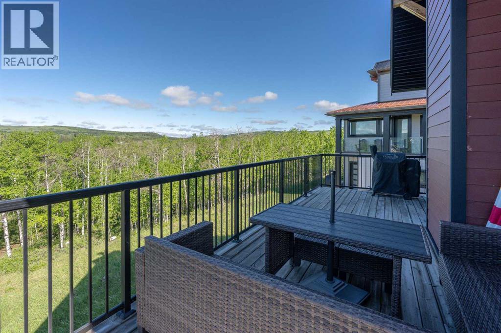 247 Cottageclub Crescent, Rural Rocky View County, Alberta  T4C 1B1 - Photo 22 - A2315059