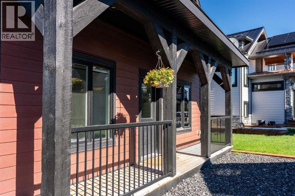 247 Cottageclub Crescent, Rural Rocky View County, Alberta  T4C 1B1 - Photo 8 - A2315059