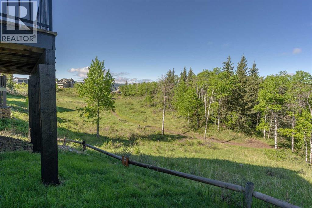 247 Cottageclub Crescent, Rural Rocky View County, Alberta  T4C 1B1 - Photo 23 - A2315059
