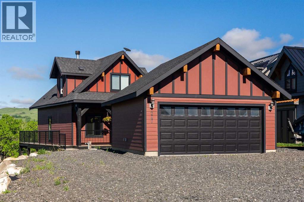 247 Cottageclub Crescent, Rural Rocky View County, Alberta  T4C 1B1 - Photo 3 - A2315059