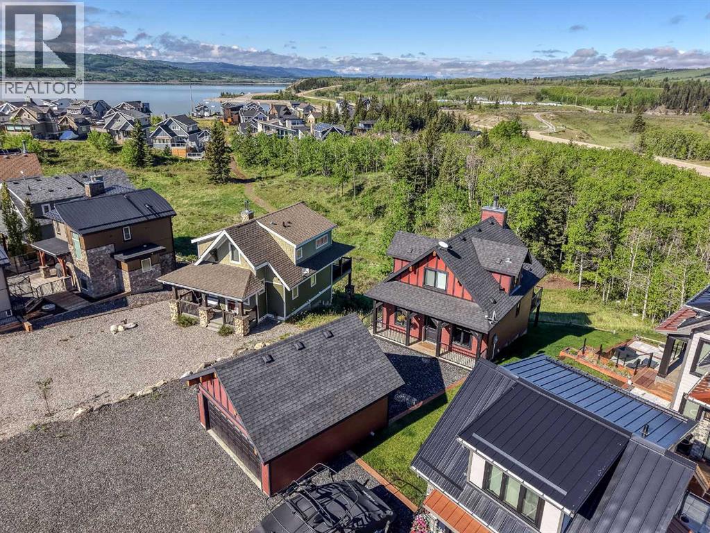 247 Cottageclub Crescent, Rural Rocky View County, Alberta  T4C 1B1 - Photo 2 - A2315059
