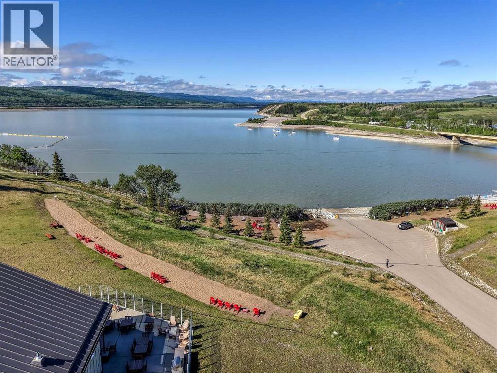 247 Cottageclub Crescent, Rural Rocky View County, Alberta  T4C 1B1 - Photo 48 - A2315059