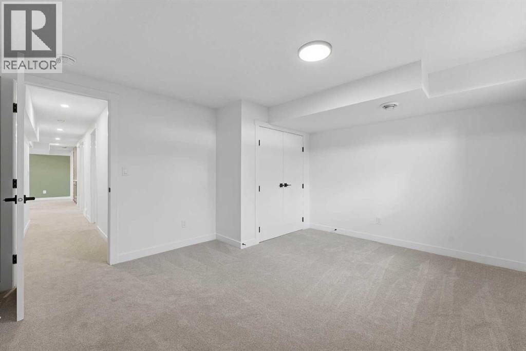 27 Glacier Drive SW, Calgary, Alberta  T3E 5A2 - Photo 32 - A2318799