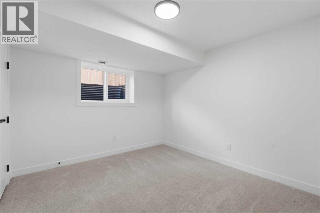 27 Glacier Drive SW, Calgary, Alberta  T3E 5A2 - Photo 31 - A2318799