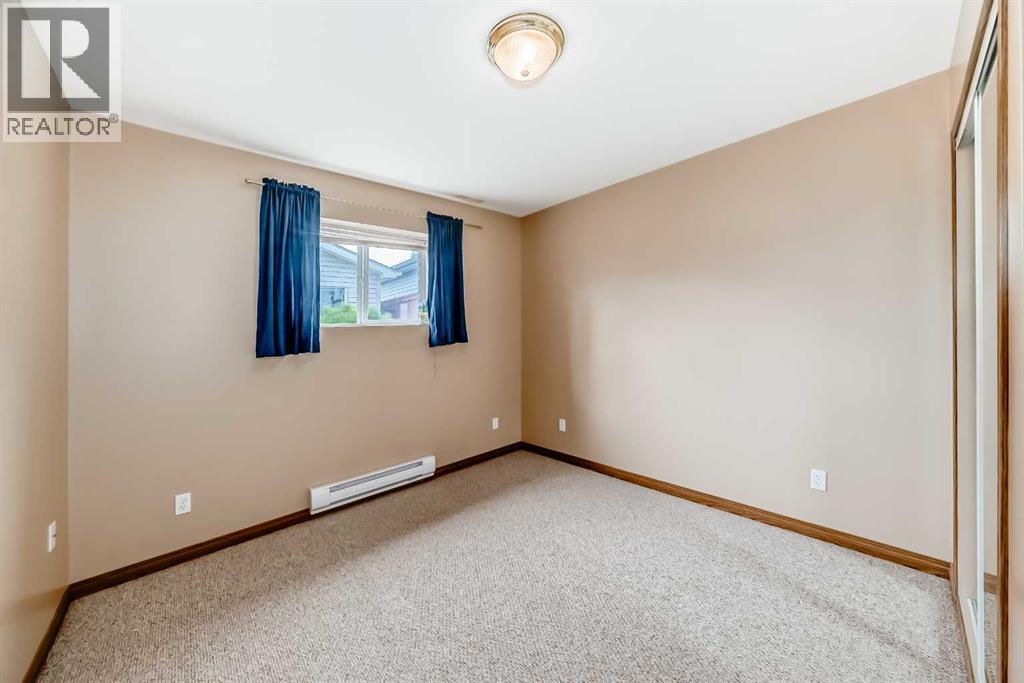 27 Covepark Drive Ne, Calgary, Alberta  T3K 5T6 - Photo 31 - A2318996