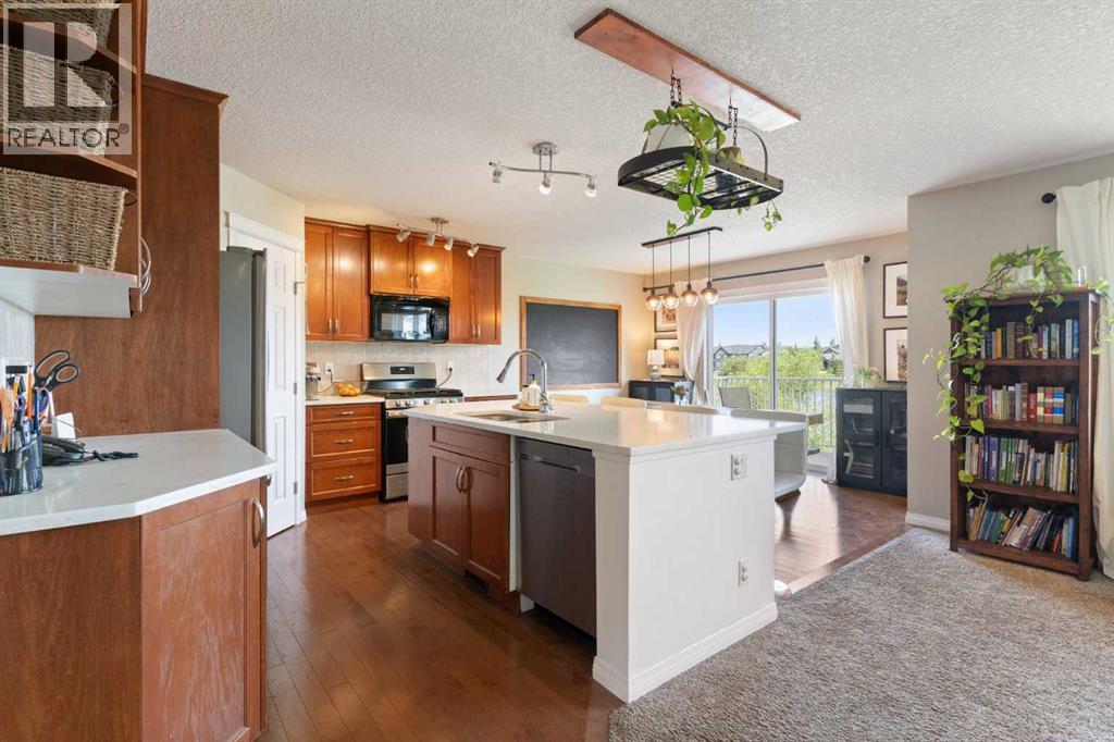 126 Morningside Point Sw, Airdrie, Alberta  T4B 3M3 - Photo 5 - A2321055