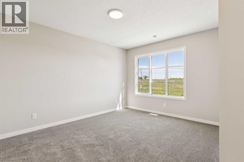 79 Hotchkiss Way SE, Calgary, Alberta  T3S 0V2 - Photo 19 - A2321188