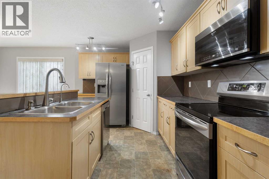 5 Taralake Terrace NE, Calgary, Alberta  T3J 0A8 - Photo 11 - A2318594