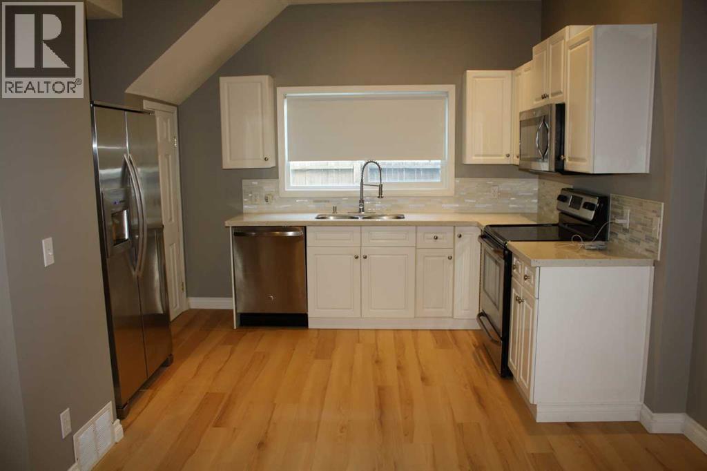 2114 22 Street, Nanton, Alberta  T0L 1R0 - Photo 34 - A2321063