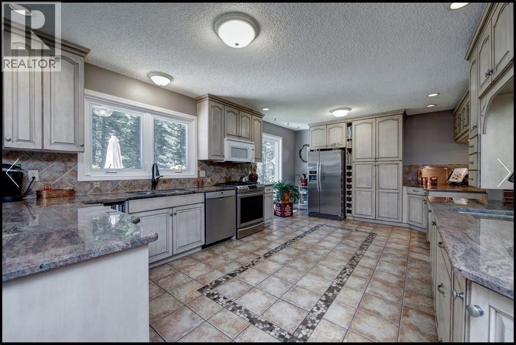 94 Redwood Meadows Drive, Rural Rocky View County, Alberta  T3Z 1A3 - Photo 16 - A2317321