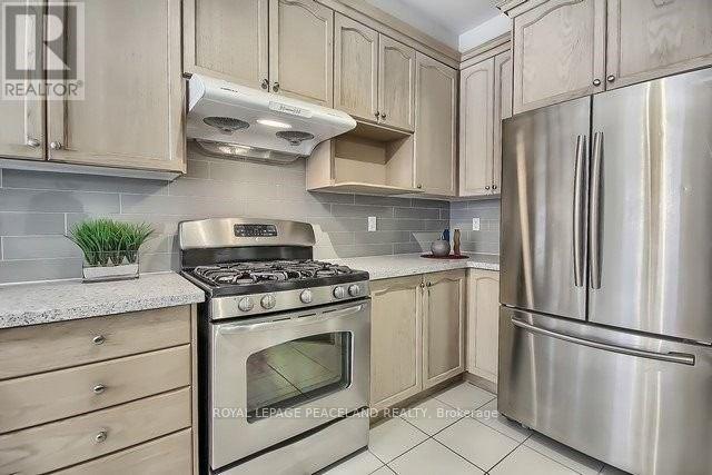 19 Kaitting Trail, Oakville, Ontario  L6M 0S6 - Photo 6 - W13446408