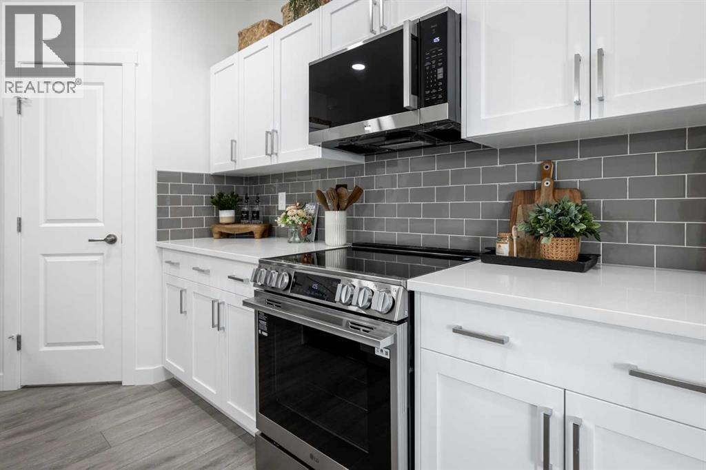 11 Heritage Point, Cochrane, Alberta  T4C 0L3 - Photo 7 - A2321222