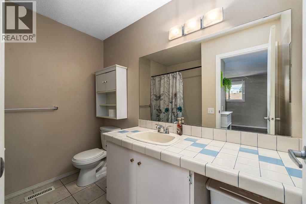 12 Woodhill Road Sw, Calgary, Alberta  T2W 3P2 - Photo 19 - A2320610