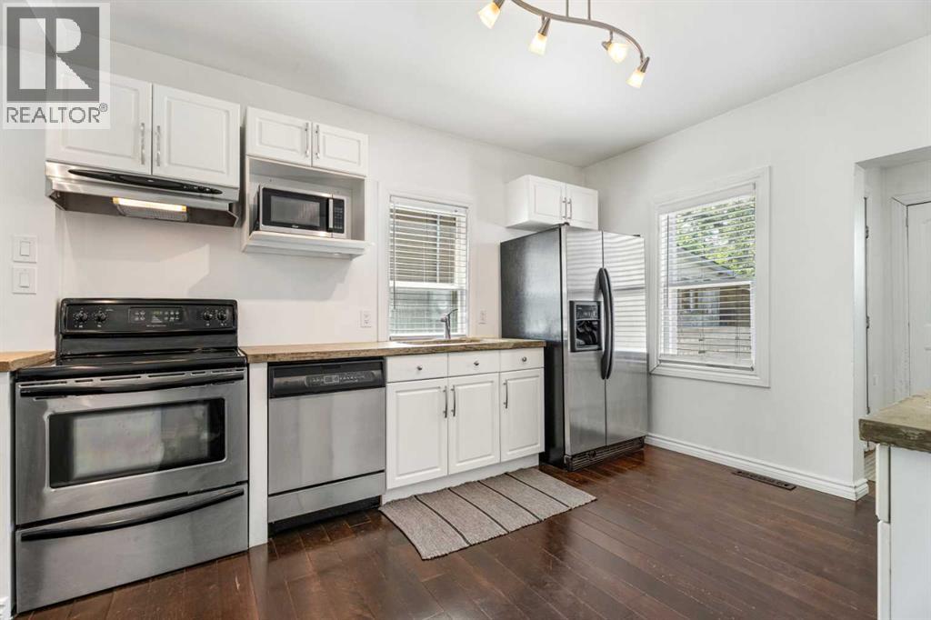 213 7a Street Ne, Calgary, Alberta  T2E 4E7 - Photo 12 - A2318019
