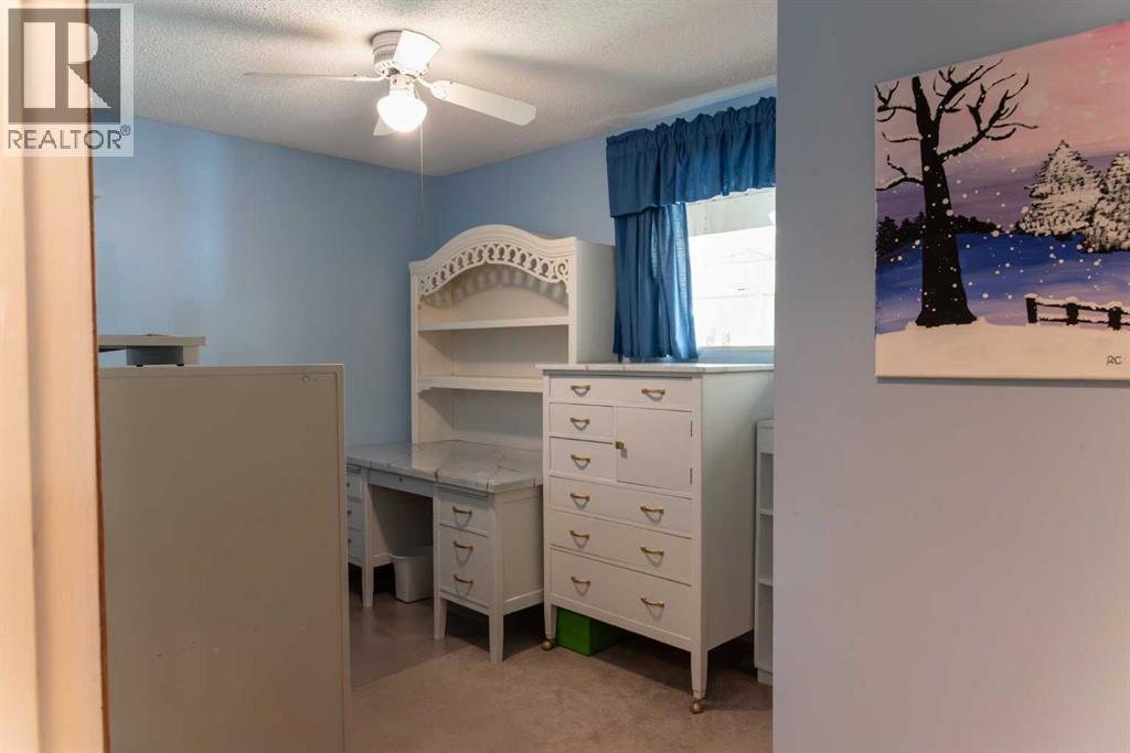 164 Huntford Road Ne, Calgary, Alberta  T2K 3Y9 - Photo 19 - A2317475