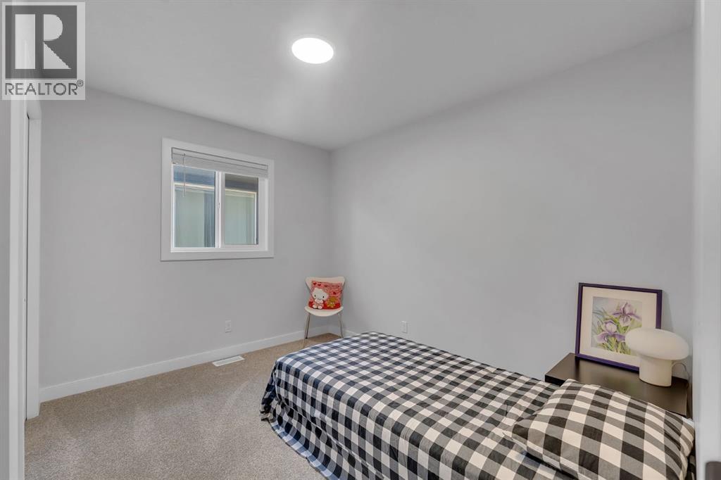 720 Midtown Drive Sw, Airdrie, Alberta  T4B 4K5 - Photo 30 - A2319029
