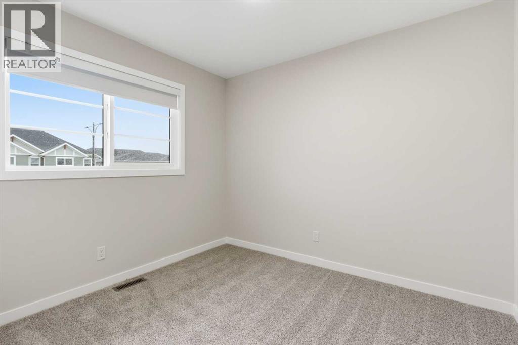 2253 Bayview Drive Sw, Airdrie, Alberta  T4B 5N3 - Photo 14 - A2320939