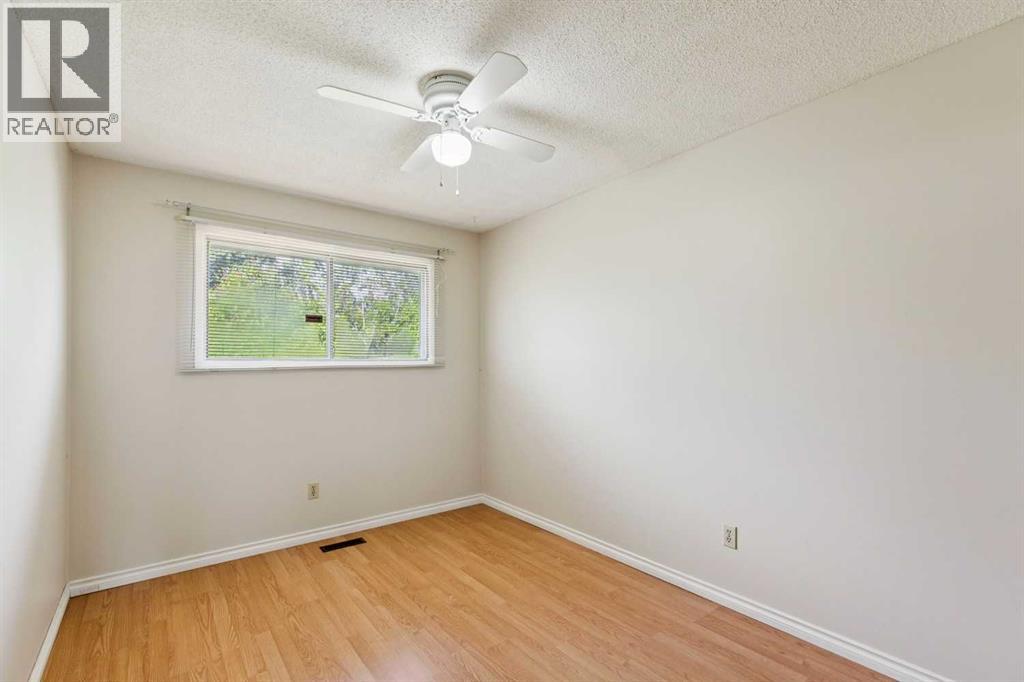 7833 Hunterquay Road Nw, Calgary, Alberta  T2K 4V1 - Photo 9 - A2317214