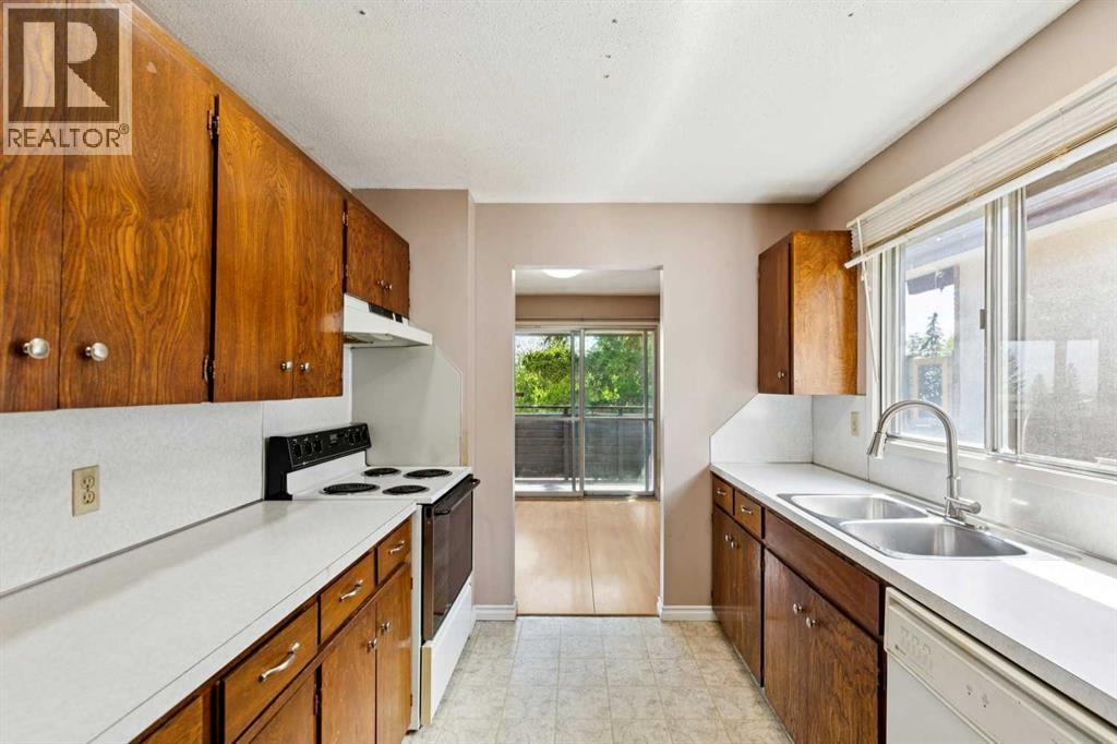 7833 Hunterquay Road Nw, Calgary, Alberta  T2K 4V1 - Photo 2 - A2317214