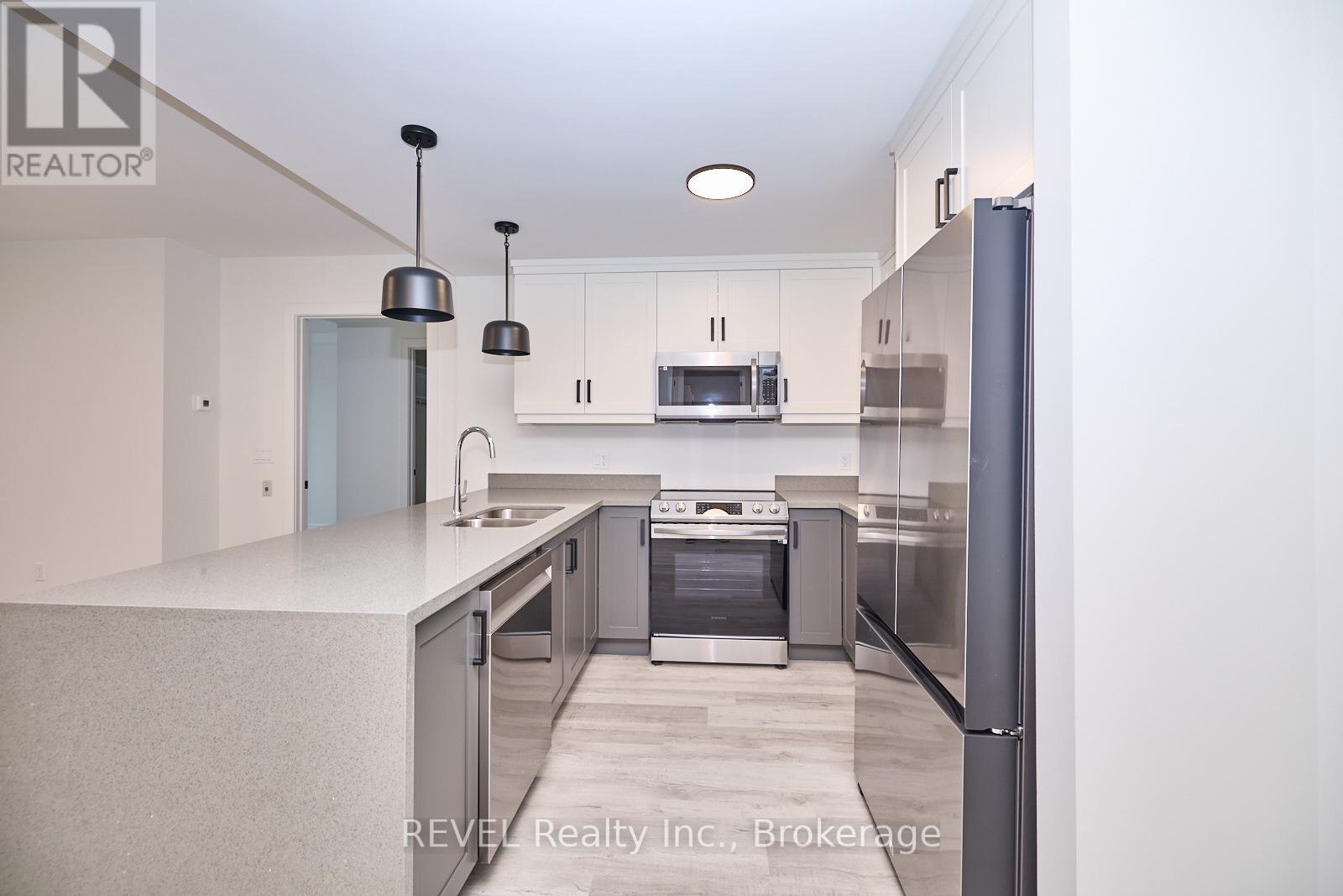 503 - 300b Fourth Avenue, St. Catharines, Ontario  L2S 0E6 - Photo 2 - X13449380