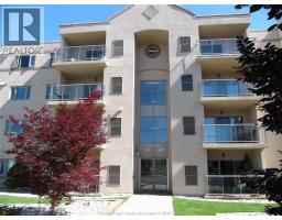 310 VILLAGE GROVE DRIVE Unit# 213, Tecumseh, Ontario