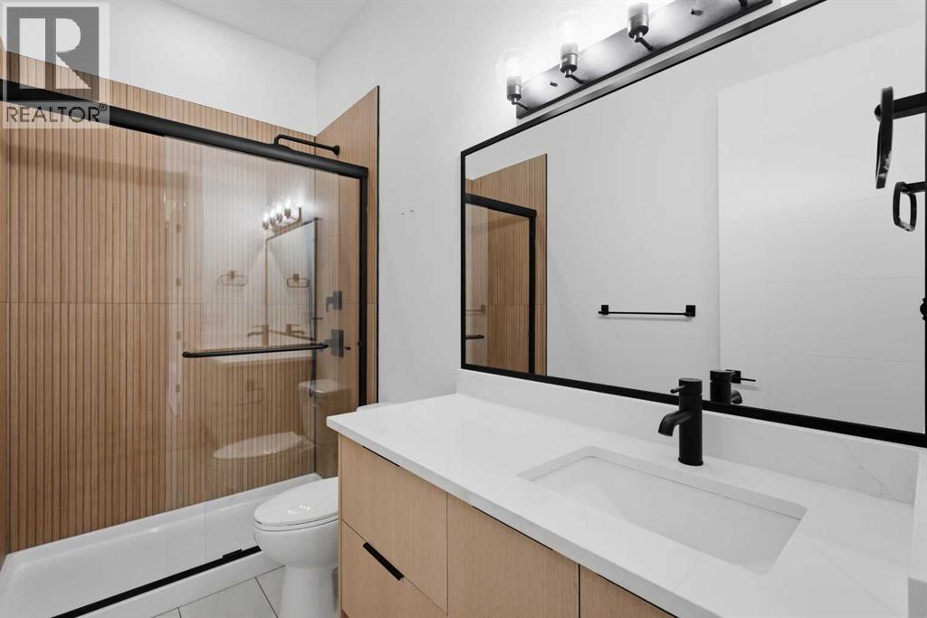 27 Glacier Drive Sw, Calgary, Alberta T3E 5A2 - Photo 18 - A2318799