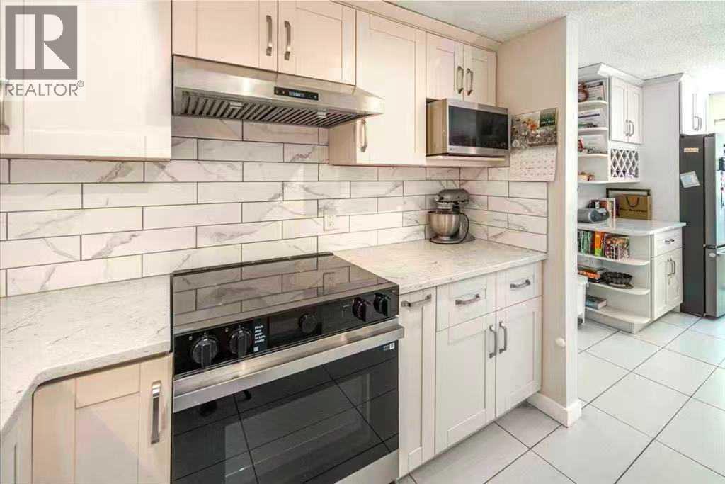 180 Woodglen Way Sw, Calgary, Alberta  T2W 4T3 - Photo 7 - A2312843