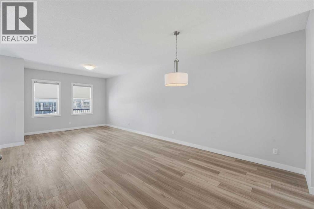 125 Edith Gate Nw, Calgary, Alberta  T3R 1Z2 - Photo 4 - A2321455