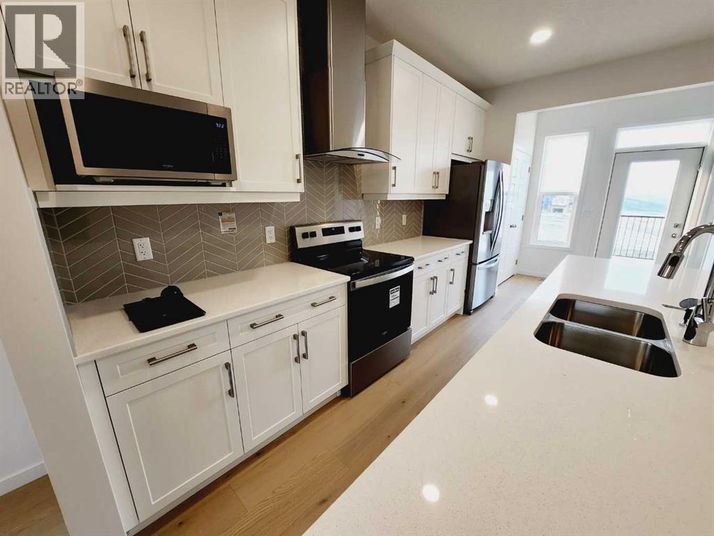 186 Aquila Drive Nw, Calgary, Alberta  T3R 1Y5 - Photo 6 - A2321568