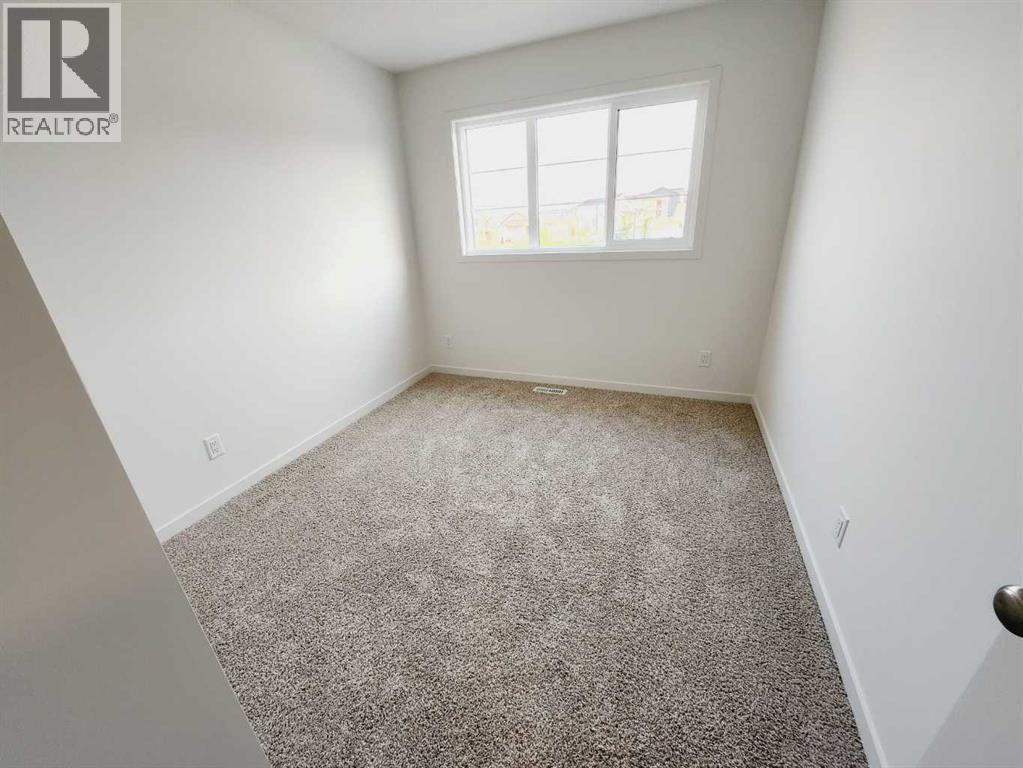 186 Aquila Drive Nw, Calgary, Alberta  T3R 1Y5 - Photo 10 - A2321568
