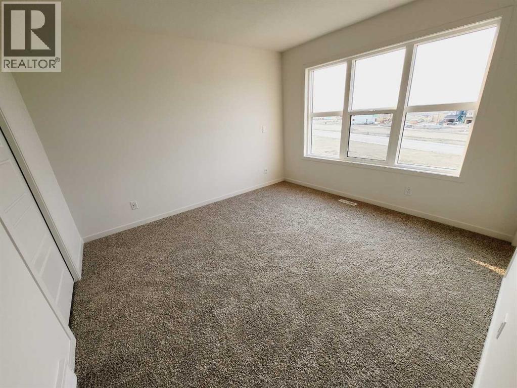 186 Aquila Drive Nw, Calgary, Alberta  T3R 1Y5 - Photo 9 - A2321568
