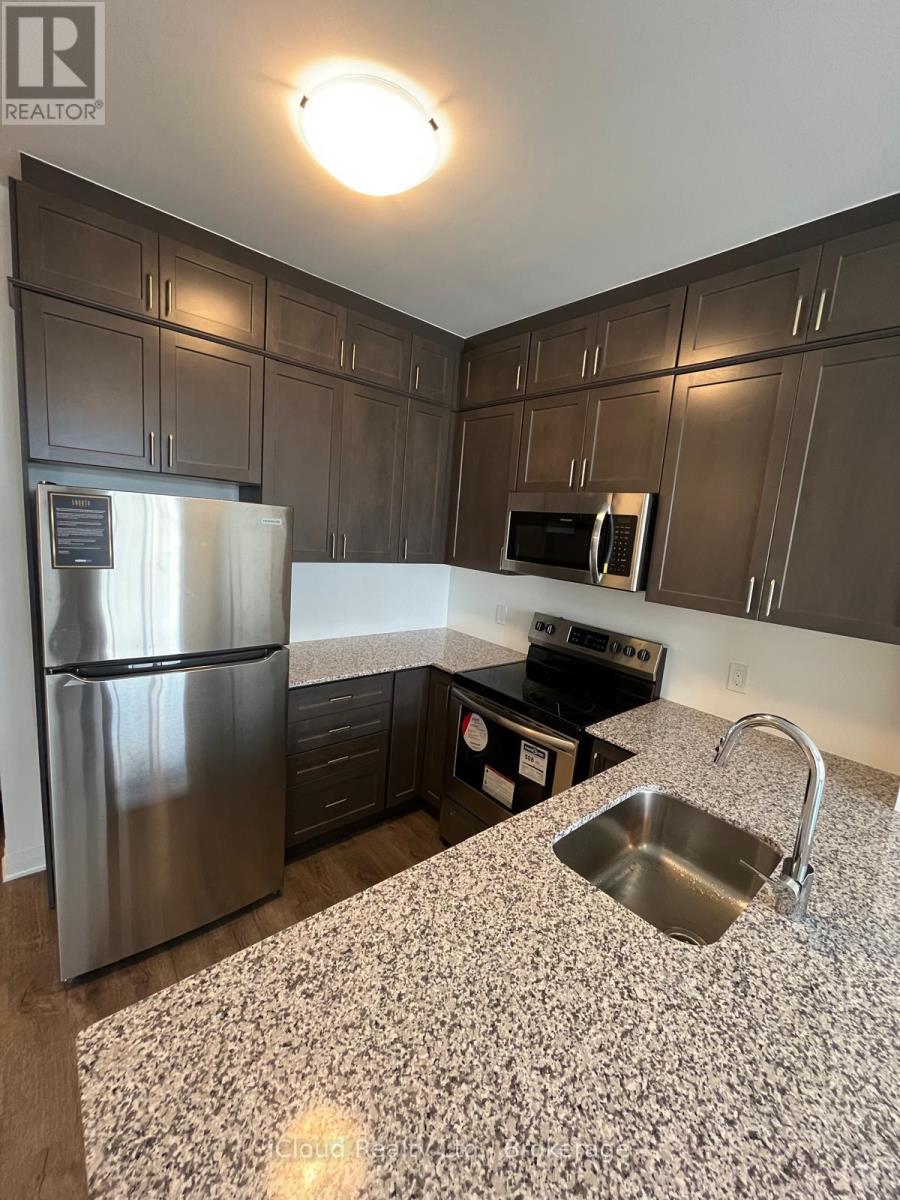 319 - 50 Kaitting Trail, Oakville, Ontario  L6M 5N3 - Photo 1 - W13452640